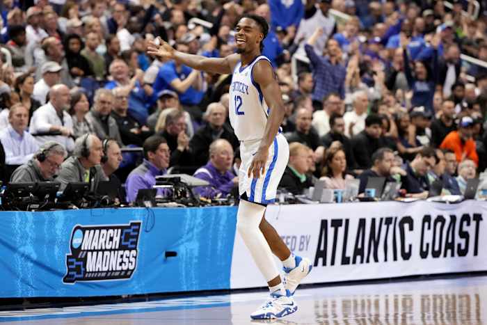 Mar 17, 2023; Greensboro, NC, USA; Kentucky Wildcats guard Antonio Reeves (12) celebrates in the first half against the Providence Friars at Greensboro Coliseum. Mandatory Credit: Bob Donnan-USA TODAY Sports